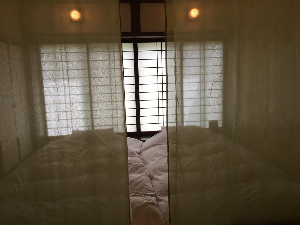 Seifusou Hotel Yufu Quarto foto