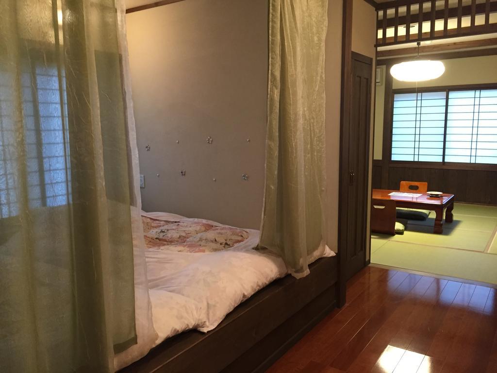 Seifusou Hotel Yufu Quarto foto