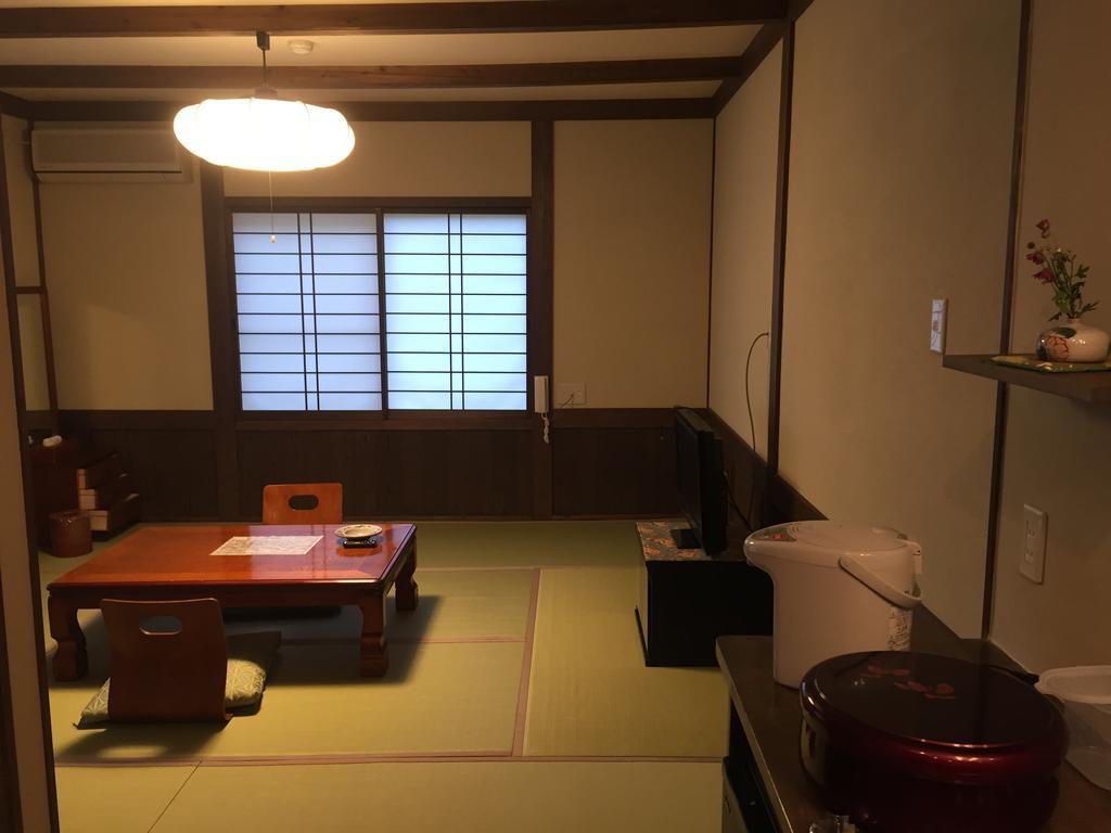 Seifusou Hotel Yufu Quarto foto